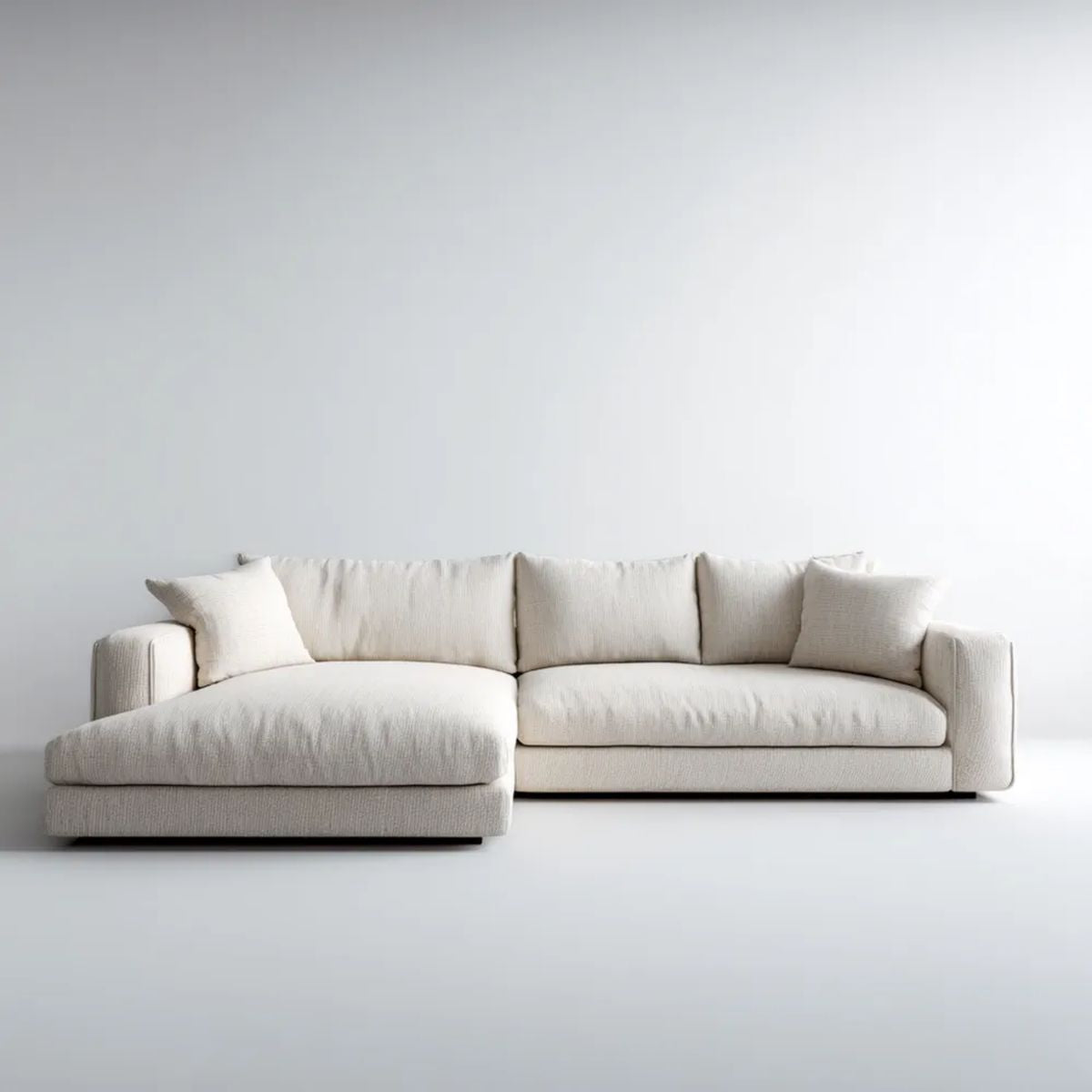 Kremowa sofa narożna w kształcie L z lewostronnym szezlongiem, tapicerka poliestrowa, 280 × 165 × 85 cm